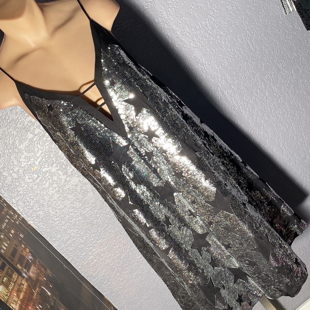 XOXO dress: A-line V-neck mini w silver sequins lined w black stars - L